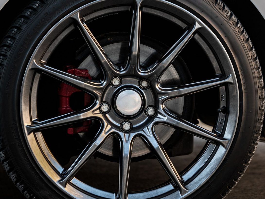 Automotive alloy wheel demonstrating a bright nickel plated finish for durability and visual appeal
